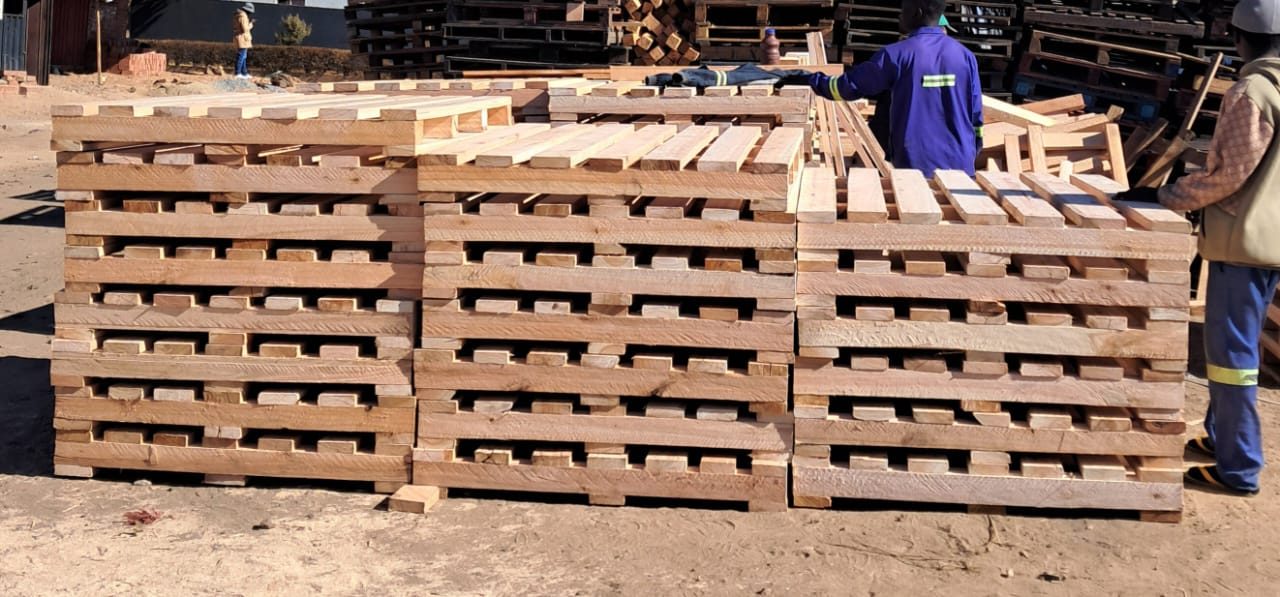 Pallets being stacked at Challywood Pallets yard Harare Zimbabwe